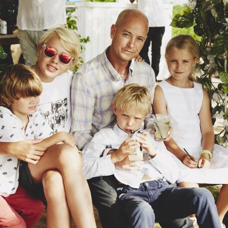 Natalia Vodianove with her husband Justin Portman and three children 